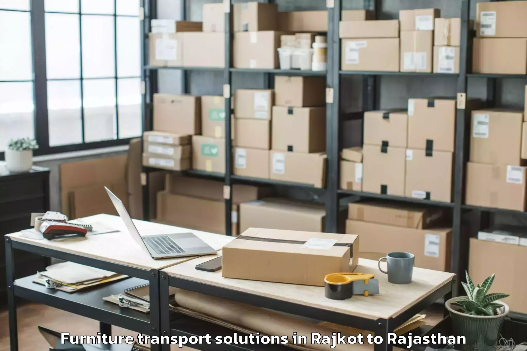 Book Rajkot to Bhasawar Furniture Transport Solutions